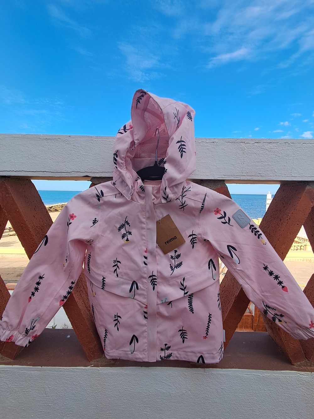 Reima Kids' Pink Floral Raincoat with Hood